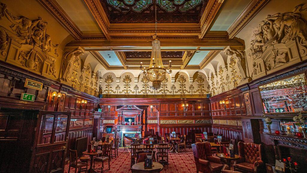 The grand interior of the Philharmonic Dining Rooms in Liverpool, a unique and opulent setting for fun and socialising.