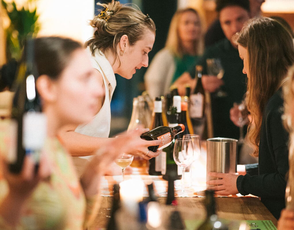 Hens enjoying a private wine tasting, an elegant activity for a Liverpool hen do weekend.